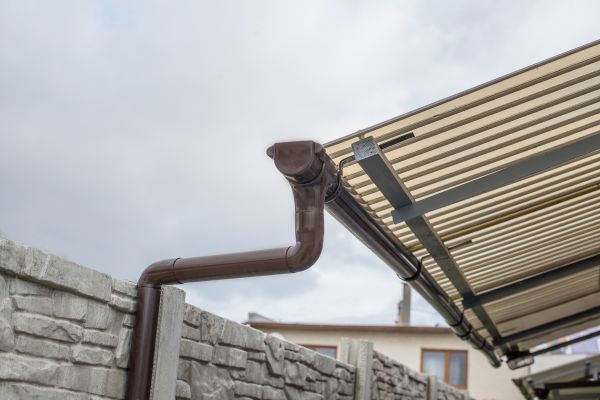Plastic Downspout Installation in Collierville